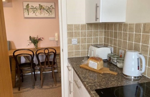 Barnoldswick Apartment | Stunning apartment + private garden. 5 mins walk to shops and bars.