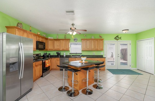 Port Canaveral House | Stunning Beach Home with Heated Pool, 200+ 5 star Reviews, Easy Beach Access!n