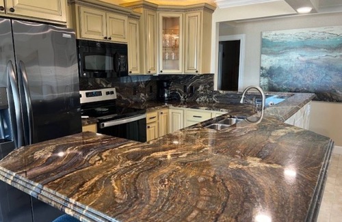 Ocean Spray Condo | Stunning beachfront ground-floor unit, a stone's throw from the sea