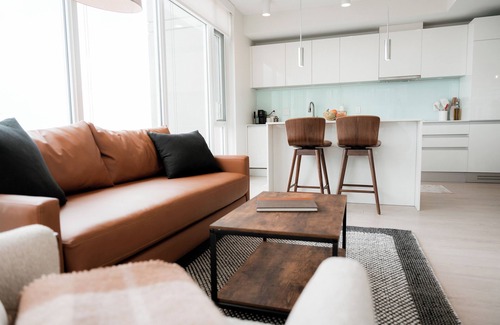 Victoria Park Condo | Stunning Corner Suite with Breathtaking Views of the Saddledome and Skyline