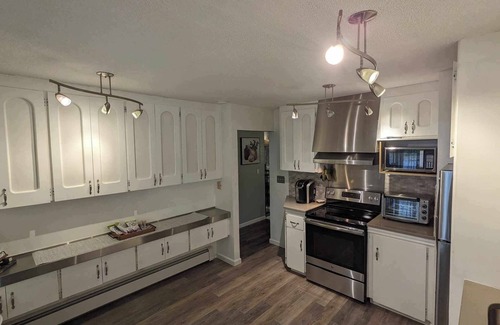 Taku - Campbell House | Stunning creekview home, centrally located. With all the extras.