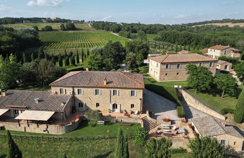 Buonconvento House | Stunning estate + winery operating as two luxury villas + infinity pool