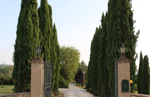 Buonconvento House | Stunning estate + winery operating as two luxury villas + infinity pool