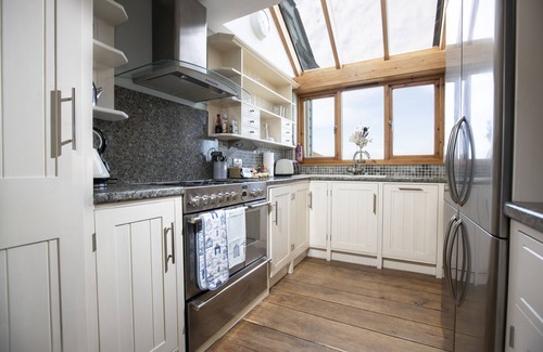 Portreath House | Stunning front line Beach House with incredible sea views, parking & garden