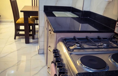 Central Kampala Bed & Breakfast | stunning golden views just a short 10-minute walk to Acacia Mall buzz