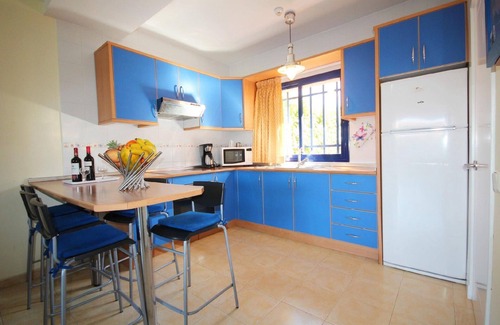 Costa Meloneras House | Stunning holiday cottage in the south of Gran Canaria with a garden and communal swimming pool