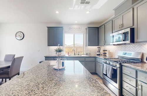Visalia House | Stunning home with an enclosed yard, pool, jetted tub, board games, W/D, & AC