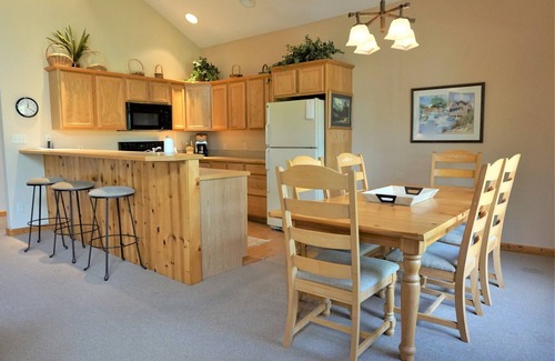 Mancelona Condo | Stunning Knotty Pine Condo at Schuss Mountain