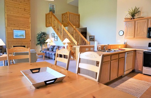 Mancelona Condo | Stunning Knotty Pine Condo at Schuss Mountain