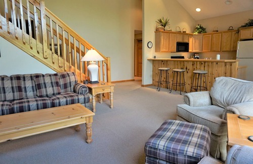 Mancelona Condo | Stunning Knotty Pine Condo at Schuss Mountain