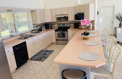 Palm Coast House | Stunning Lake house,heated pool, pet friendly,close to beach, restaurants ,bars