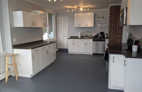 Dedham Cottage | Stunning lakefront home with 270° water views and private beach near Acadia