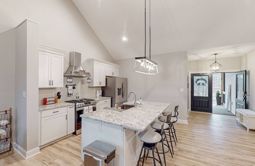 Wirtz House | Stunning lakefront oasis with a kayak, large deck, games, & tranquil views