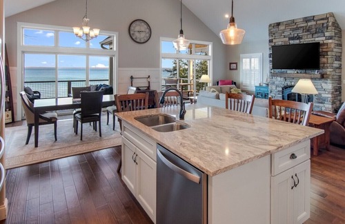 Suttons Bay House | Stunning Lakefront Home With Dock and Boat Lift
