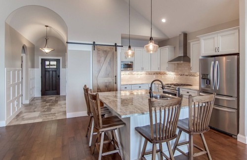Suttons Bay House | Stunning Lakefront Home With Dock and Boat Lift