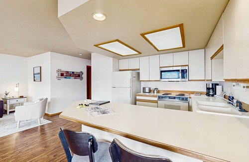 Chelan Condo | Stunning lakeside condo with shared pools, hot tub, and spectacular lake views