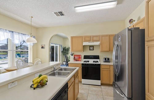Crescent Lakes Villa | Stunning Lakeview Executive Villa - south facing pool & spa