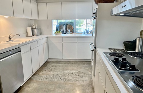 Canyon Corridor Condo | Stunning light-filled Mid-Century Mod Condo in iconic Canyon View Estates.