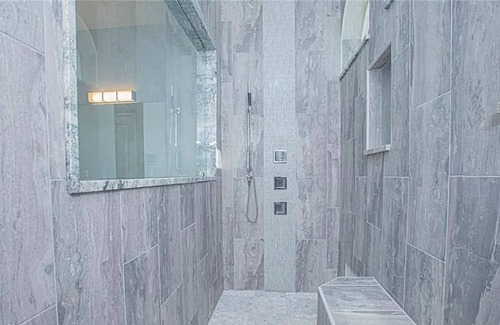 Grant-Valkaria House | Stunning Mediterranean-style vacation home w/ fabulous spillover hot tub/pool!