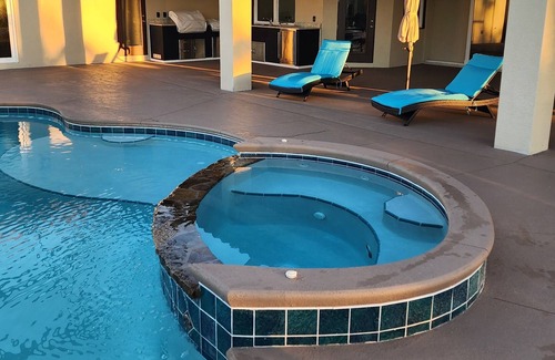 Grant-Valkaria House | Stunning Mediterranean-style vacation home w/ fabulous spillover hot tub/pool!