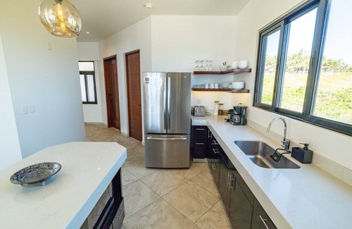 Isla Mujeres House | Stunning, new, unique, Caribbean front property in Punta Sur - Casa Carey!
