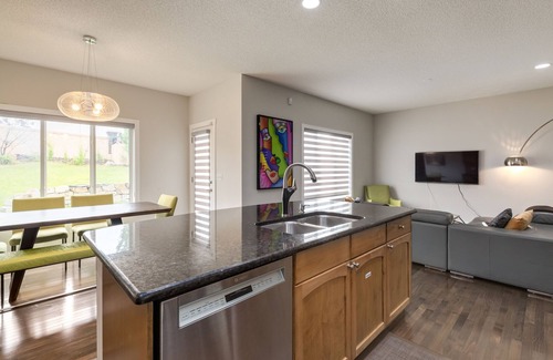 Southwest Calgary House | Stunning Oasis in Upscale Aspen Woods, Close to COP & Downtown