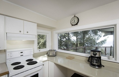 Otter Point House | Stunning ocean and mountain views on a peaceful, family-friendly acerage.