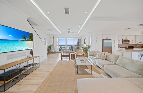 George Town Condo | Stunning Ocean Front 2-bedroom condo + office minutes away from Seven Mile Beach
