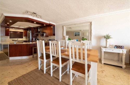 Jeffreys Bay Apartment | Stunning ocean vistas, near top surf spots, shops; private, all amenities.