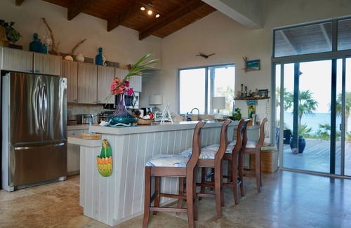 Savannah Sound House | Stunning, Private, Pink Sand, Beachfront Estate with 70ft dock on Bonefish Flats