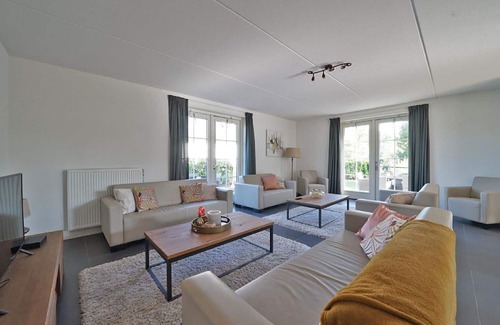 Susteren House | Stunning private villa for 12 guests with WIFI, pool, TV, terrace and parking