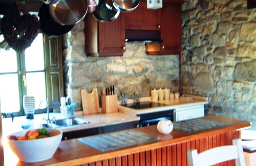 Pilona House | Stunning Restored School House with Orchard & River in Idyllic Location