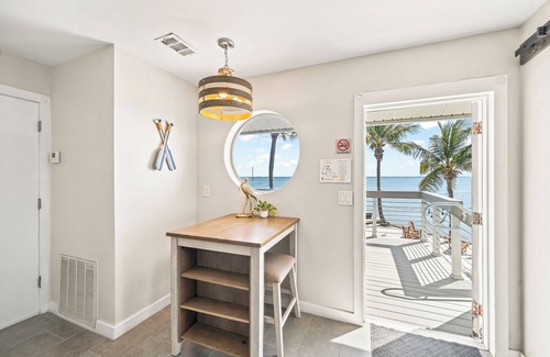 Orlando Beach Condo | Stunning Riverfront Balcony Suite W/Private Beach Access & Event-Ready Setting ✨🌊
