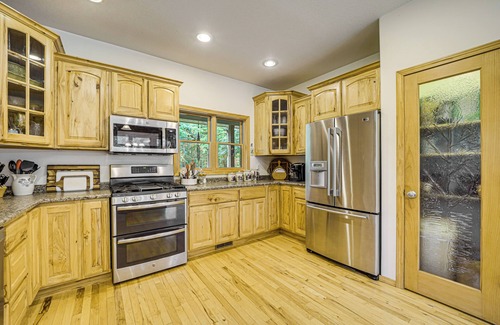 Lake City House | Stunning Riverfront Retreat in Northern Michigan!