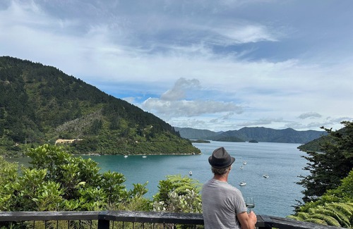 Whatamango Bay House | Stunning sea views from every room, an art filled retreat & drive on access