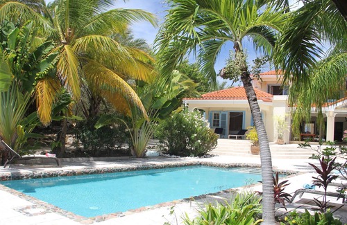 Falmouth Harbour Villa | Stunning six bedroom seafront villa with pool, garden and sea views