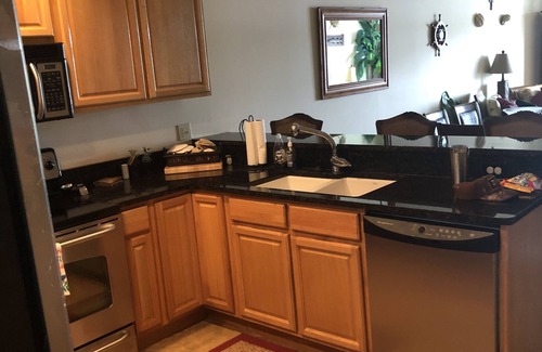 Steinhatchee Condo | Stunning Top Floor Views of The Steinhatchee River with Private Boat Slip/Pool!
