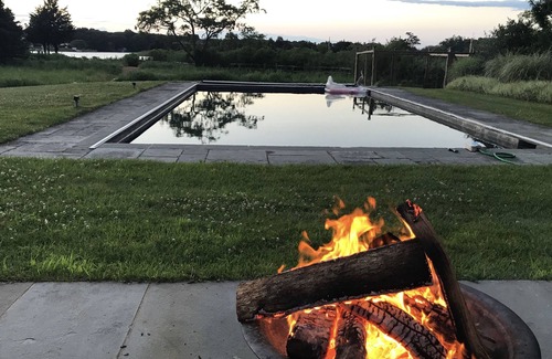 Sag Harbor House | Stunning Waterfront 4 Bedroom Home with Pool, a Dock, an Acre of Land & a Boat