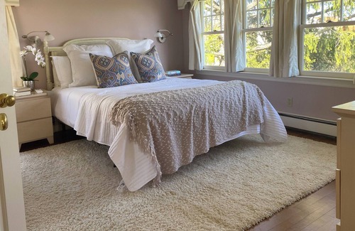 Riverside House | Stunning waterfront house with dock, walk to shops, restaurants, beach, train.