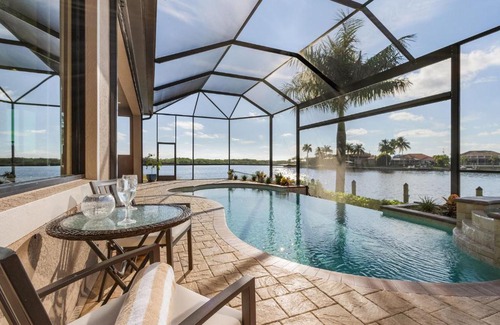 Burnt Store Villa | STUNNING Waterfront Villa with Infinity Pool, Spa, Preserve Views Casa del Sol - Roelens