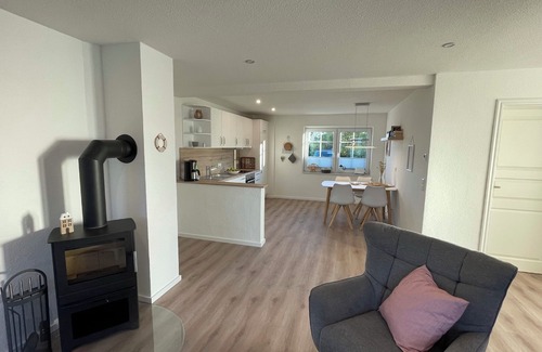 Gelting Apartment | Stuuv een - sauna, wood-burning stove, terrace, garden furniture, fenced, e-charging station