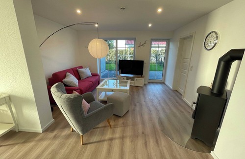 Gelting Apartment | Stuuv een - sauna, wood-burning stove, terrace, garden furniture, fenced, e-charging station