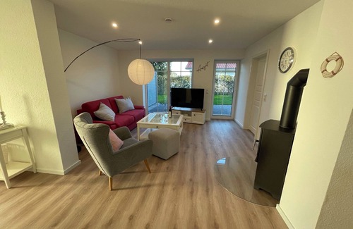 Gelting Apartment | Stuuv een - sauna, wood-burning stove, terrace, garden furniture, fenced, e-charging station