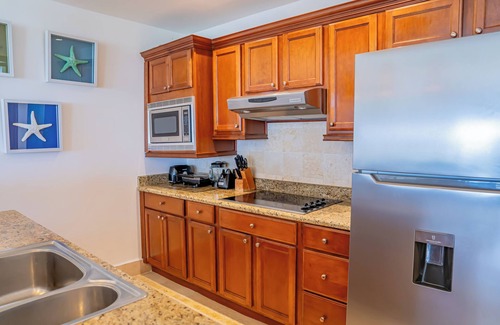 Punta Cana Apartment | Stylish 1-Bedroom Apartment with Pool Access, Full Kitchen, Balcony & Golf View