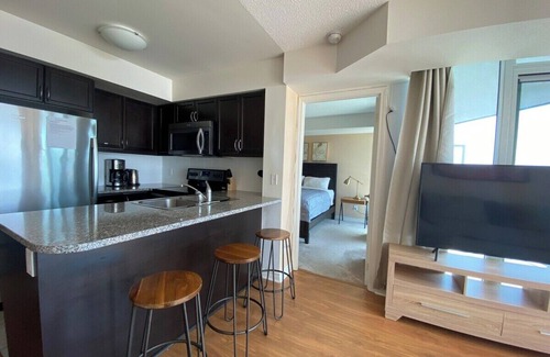 Toronto Entertainment District Apartment | Stylish 1 Bedroom Condo with Unobstructed CN Tower View