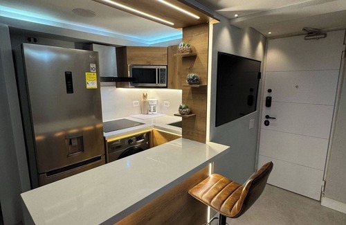 Medellin Apartment | Stylish 1BR Getaway, Jacuzzi, Fireplace, Gym and AC