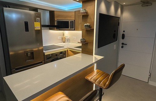 Medellin Apartment | Stylish 1BR Getaway, Jacuzzi, Fireplace, Gym and AC