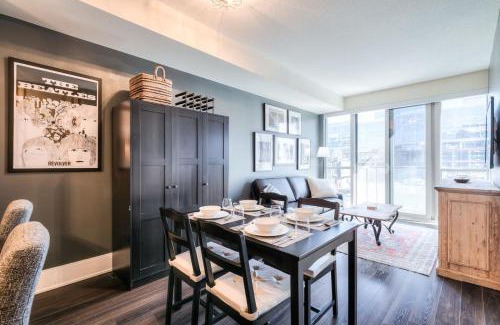 Wellington Place Apartment | Stylish 1BR plus Den with Balcony in Downtown
