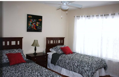 Venetian Bay Villages House | Stylish 2-Story Townhome: 4BR, 4 Pools, 2 Playgrounds, and Resort Perks Galore!