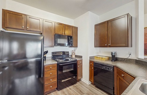 Goose Creek Condo | Stylish 2BR: Pet Friendly in Walkable Resort with a Pool